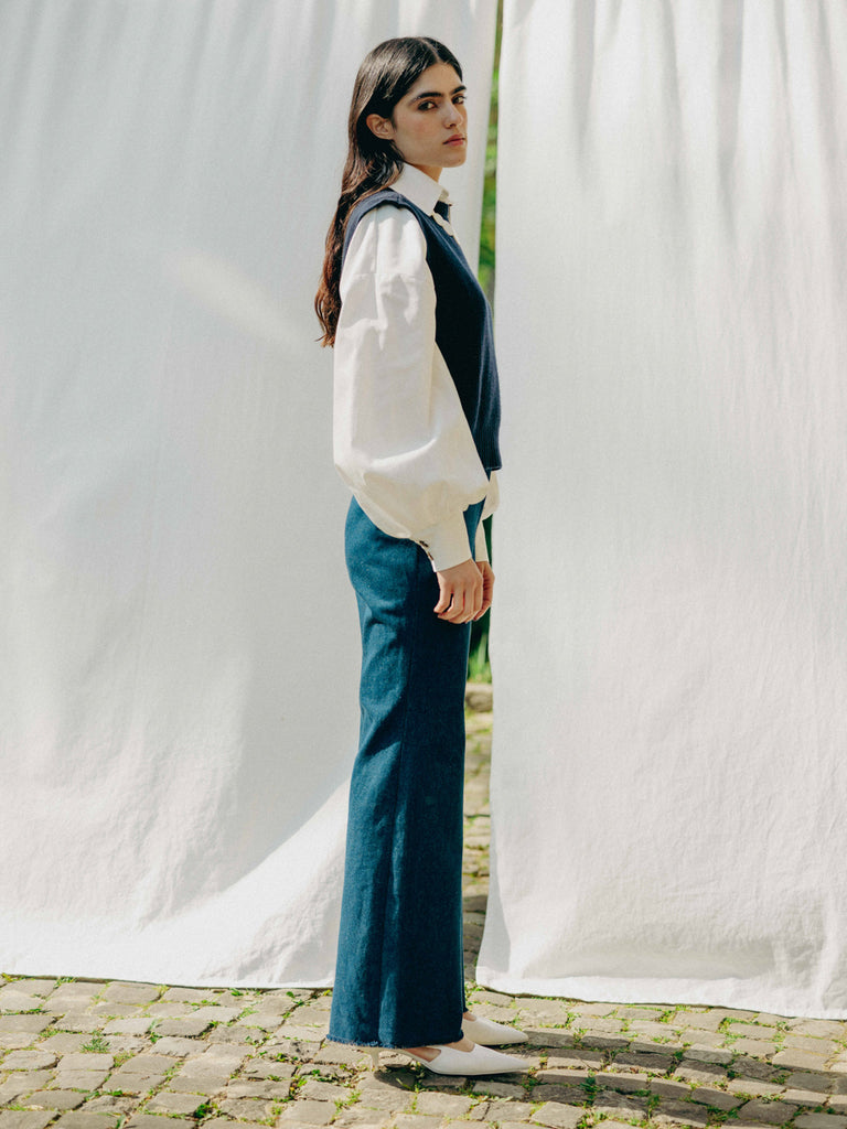 ASTRA: Flared legs, hook closure, handmade fringes. Sustainable, versatile, stylish. GOTS certified.