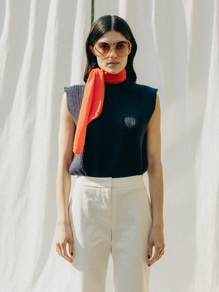 Indulge in luxury with our Navy Statement Piece, 100% recycled cashmere from Italy. Snug, fitted collar for timeless elegance