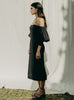 Sanaa dress: puff sleeves, feminine neckline, organic cotton satin, GOTS certified, available in black and white.