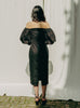 Sanaa dress: puff sleeves, feminine neckline, organic cotton satin, GOTS certified, available in black and white.